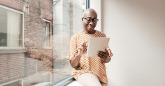 woman-scrolling-on-a-tablet